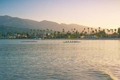 santa barbara harbor people riding boat on body of water during daytime united states